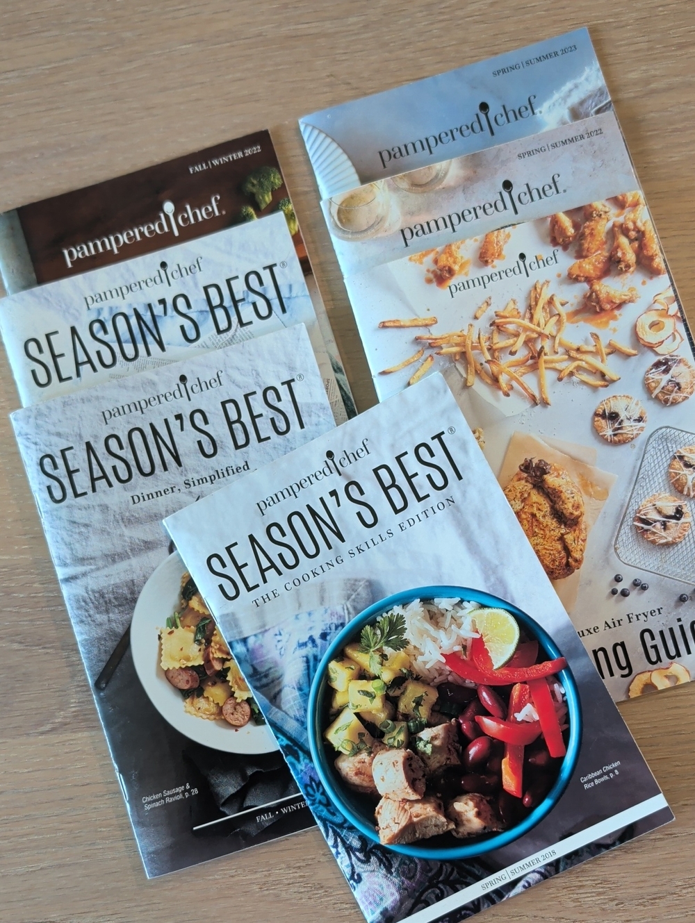 7 Pampered Chef Recipe Booklets.